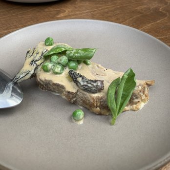 Tavernetta - Milk-braised pork collar with morels and peas - Italian Near Me - Denver, Colorado