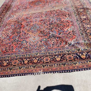 The Clean - 1/2 of my rugs before. So dusty and dirty, full of dog hair and smelled like dogs too. - Home Cleaning Near Me