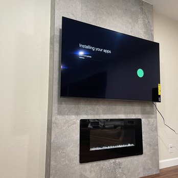 Universal Mounting Services - Fireplace TV - TV Mounting Near Me