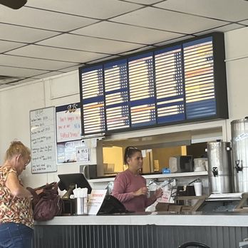 AJs Restaurant - a man and a woman at the counter - New American Near Me - Harrisburg, North Carolina AJs Restaurant - a man and a woman at the counter - New American Near Me - Harrisburg, North Carolina