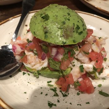 Sangria Tapas Restaurant - AGUACATE RELLENO Avocado, shrimp, red onions, cilantro, tomatoes, olive oil, lemon. Absolutely so delicious. Shrimp so tender. - Tapas/Small Plates Near Me - Mahwah, New Jersey