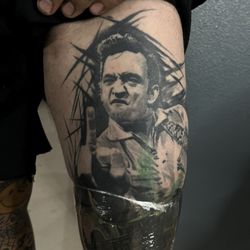 Sacred Symbols Tatau - Johnny cash thigh tattoo