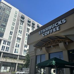 Exterior outside entrance of Starbucks - Morning iced coffee - Sacramento, California Exterior outside entrance of Starbucks - Morning iced coffee - Sacramento, California