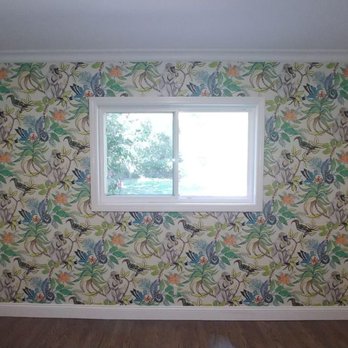 Detail Wallpaper Installation - Nursery accent wall - they placed the paper so that the monkeys weren't cut off by the window, and were symmetrical. - Wallpapering Near Me