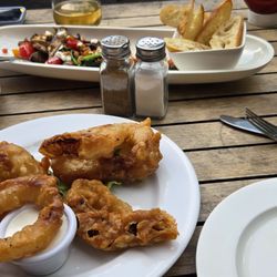Copper Kettle Pub - Appetizers: Back - Assorted Mushroom Plate. Front - Hand Cut Onion Rings.