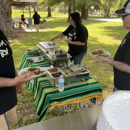 Rice, beans, and salsa bar. Taken from behind his serving grill. Rice, beans, and salsa bar. Taken from behind his serving grill.