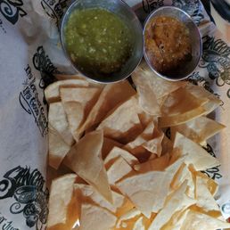 Freshly fried corn tortilla chips and tasty salsa. wow. Freshly fried corn tortilla chips and tasty salsa. wow.