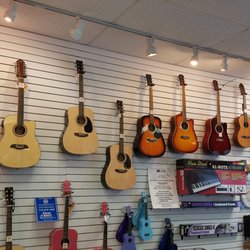 Richmond Music Center - A selection of some of our guitars, keyboards, and stands.