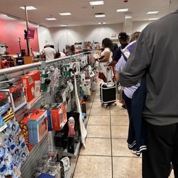 A long line of people waiting for 20-30 minutes to check out A long line of people waiting for 20-30 minutes to check out