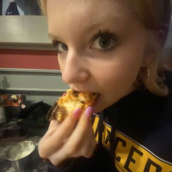 Joe Boccardi's Ristorante - eating pizza but a different angle - Pizza Near Me - Eureka, Missouri