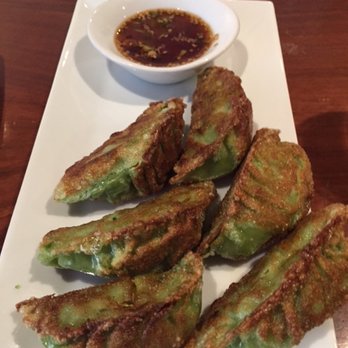 Mandu - veggie dumplings, perfectly pan-fried. Love the dipping sauce! - Korean Near Me - Washington, DC, District of Columbia