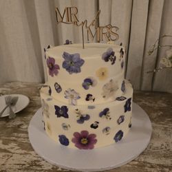 The Bakery House - Our wedding cake tasted even better than it looked, and that's saying something! Thanks, Bakery House!