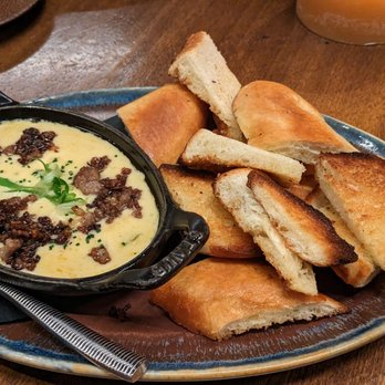 Toro Snowmass - Colorado Lamb Queso Fundido - Wine Bars Near Me - Snowmass Village, Colorado