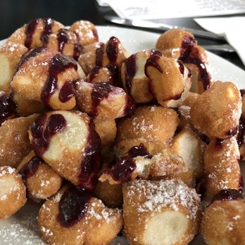 South End Bistro - Hot from the pan, Beignets drizzled with raspberry sauce. - American Near Me - Pawleys Island, South Carolina South End Bistro - Hot from the pan, Beignets drizzled with raspberry sauce. - American Near Me - Pawleys Island, South Carolina