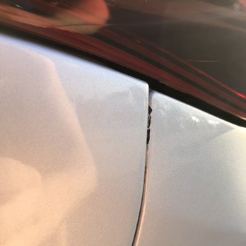 Eddie Dimeglio's Collision Experts - Paint chip on bumper at rear quarter panel - Body Shops Near Me - Davie, Florida