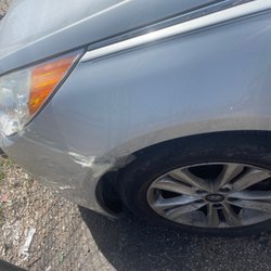 E-Z Auto Rental - Their cars are duct taped together and they false advise. If I could give this plqce a negative 1 I would. Never go here