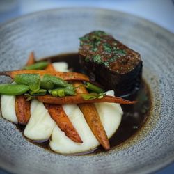 The Mountain House - Red Wine Braised Short Rib w/Yukon Gold Mashed Potatoes, Charred Baby Carrots & Sweet Peas