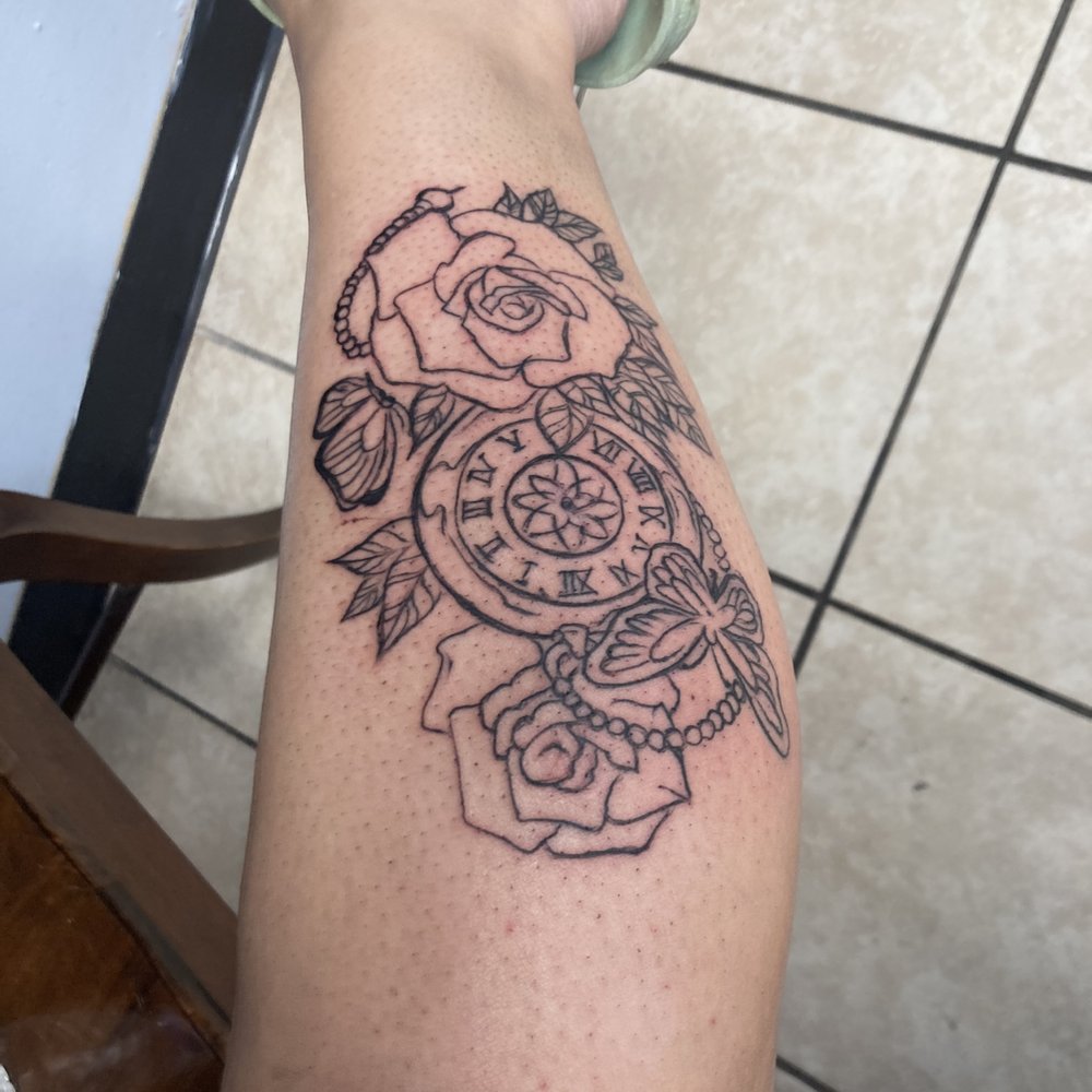 Underworld Tattoos - Sloppy work look at the line work and then the leaves are not sym - Tattoo Near Me - Conroe, Texas Underworld Tattoos - Sloppy work look at the line work and then the leaves are not sym - Tattoo Near Me - Conroe, Texas