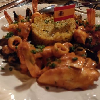Dali Restaurant & Tapas Bar - Mariscos en crema de Camerones (scallops, squid, mussels, shrimp, octopus with Spanish rice) - Spanish Near Me - Somerville, Massachusetts