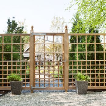 Hamptons Silverleaf Landscaping Design - Custom gate and fence made from Clear Cedar with ornate hardware. - Landscaping Near Me - Mattituck, New York Hamptons Silverleaf Landscaping Design - Custom gate and fence made from Clear Cedar with ornate hardware. - Landscaping Near Me - Mattituck, New York