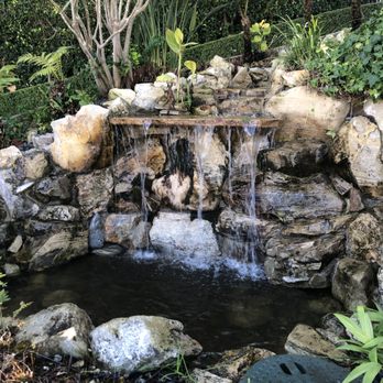Timeless Ponds and Fountains - Natural Waterfall on slope of hill. Timeless Ponds and Fountains did an AMAZING JOB on this cleanout - Landscape Architects or Designers Near Me Timeless Ponds and Fountains - Natural Waterfall on slope of hill. Timeless Ponds and Fountains did an AMAZING JOB on this cleanout - Landscape Architects or Designers Near Me
