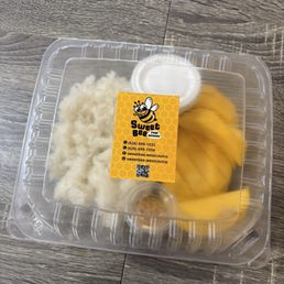 Portion of mango sticky rice Portion of mango sticky rice