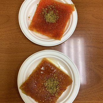 Knafeh Cafe - Crispy knafeh (top) and soft knafeh (bottom) (~$5 each). - Middle Eastern Near Me - Anaheim, California Knafeh Cafe - Crispy knafeh (top) and soft knafeh (bottom) (~$5 each). - Middle Eastern Near Me - Anaheim, California