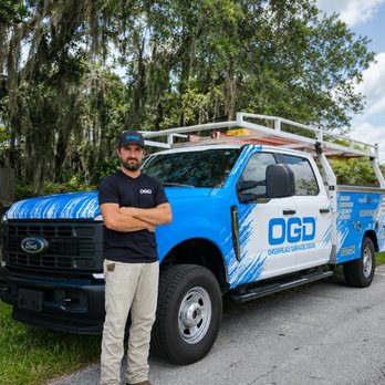 OGD Overhead Garage Door - Professional OGD technician arriving on-site in a fully equipped service truck, ready to handle garage door repairs and installations. - Garage Door Services Near Me - Bryan, Texas OGD Overhead Garage Door - Professional OGD technician arriving on-site in a fully equipped service truck, ready to handle garage door repairs and installations. - Garage Door Services Near Me - Bryan, Texas