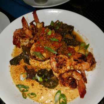 Catch 27 - Grits and shrimp with collard greens - Southern Near Me - Saint Augustine, Florida Catch 27 - Grits and shrimp with collard greens - Southern Near Me - Saint Augustine, Florida