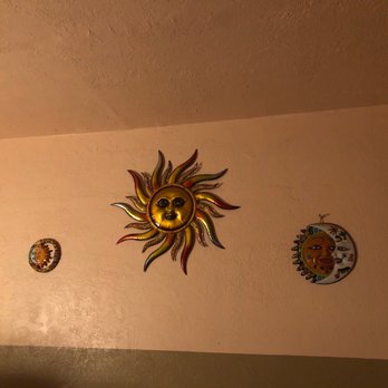 Sun Brewing - three decorative sun faces on a wall - Breweries Near Me - Canutillo, Texas Sun Brewing - three decorative sun faces on a wall - Breweries Near Me - Canutillo, Texas