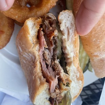 Coasters Brew Pub - Cuban sandwich with onion rings - Sports Bars Near Me - Milwaukie, Oregon Coasters Brew Pub - Cuban sandwich with onion rings - Sports Bars Near Me - Milwaukie, Oregon