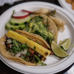 Mi Viejito Pueblito - Tacos al pastor con pina (porn and pineapple) in the foreground; carne asada with guacamole in the background. Both were excellent.
