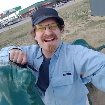 Tesla Supercharger - Don't forget to hug the Sinclair Dinosaur on the way back from the Iron Skillet! - EV Charging Stations Near Me - Laramie, Wyoming Tesla Supercharger - Don't forget to hug the Sinclair Dinosaur on the way back from the Iron Skillet! - EV Charging Stations Near Me - Laramie, Wyoming