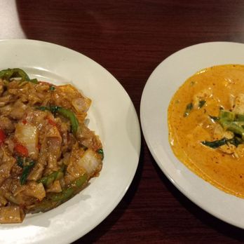 Pad Thai Cafe - Drunken Noodles with Shrimp spice level 4 of 5, and Pa Nang Curry with Chicken spice level 3 of 5. - Thai Near Me - Glendale, Arizona