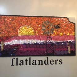 Flatlanders Pizzeria - Mural done out of all recycled caps and pieces
