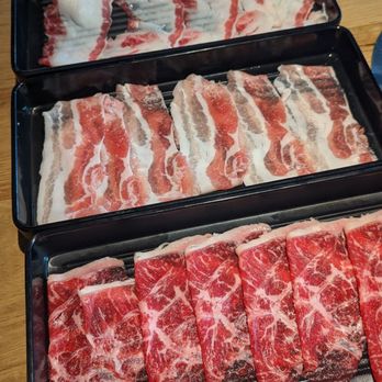 dPot Unlimited - From Top to Bottom: Lamb (red & lean, dinner), Wagyu Galbi Eye (lunch), Pork Belly (lunch), Prime Chuck Top Blade (dinner) - Hot Pot Near Me - Irvine, California