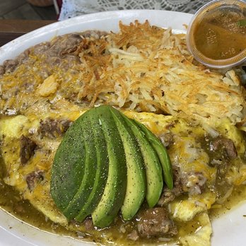 Rodeo Cafe - Chile Verde Omelet and added avocado - look at that verde! - Breakfast & Brunch Near Me - Rialto, California Rodeo Cafe - Chile Verde Omelet and added avocado - look at that verde! - Breakfast & Brunch Near Me - Rialto, California