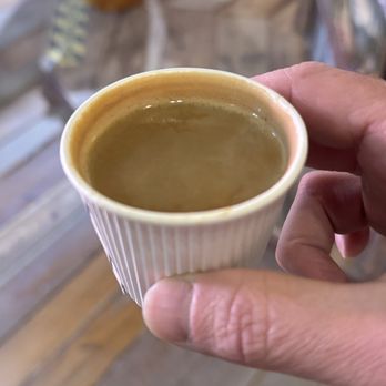 The Coffee Syndicate - Double espresso with a little bit of hot milk just dumped into it super nasty - Coffee & Tea Near Me - Gatlinburg, Tennessee The Coffee Syndicate - Double espresso with a little bit of hot milk just dumped into it super nasty - Coffee & Tea Near Me - Gatlinburg, Tennessee