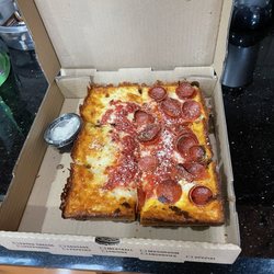 Jackleg Pizza Company - Half pepperoni, half cheese Detroit style deep dish