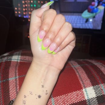 Sola Salon Studios - Beautiful green french tip nails with tiny pink hearts on each nail - Hair Salons Near Me - Fullerton, California