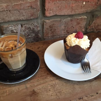 Riverhill Coffee Bar - Iced soya latte and a vegan pear and raspberry cupcake - Coffee & Tea Near Me - Glasgow, GLG Riverhill Coffee Bar - Iced soya latte and a vegan pear and raspberry cupcake - Coffee & Tea Near Me - Glasgow, GLG