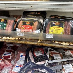 Foodland - Rusty, decrepit shelving! Unwashed meat  cases.