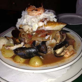 Place Pigalle - Bouillabaisse Provençale with Prawns, Clams, Mussels, Dungeness Crab, Seasonal Fish, in a Saffron-Tomato Broth, w/ crostini Roui - French Near Me - Seattle, Washington Place Pigalle - Bouillabaisse Provençale with Prawns, Clams, Mussels, Dungeness Crab, Seasonal Fish, in a Saffron-Tomato Broth, w/ crostini Roui - French Near Me - Seattle, Washington