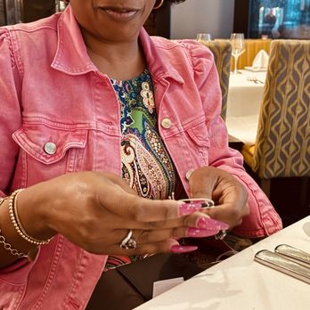 Ruth's Chris Steak House - looking at card - Steakhouses Near Me - Long Beach, California