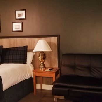 Surftides Hotel - Bed and couch - Hotels Near Me - Lincoln City, Oregon Surftides Hotel - Bed and couch - Hotels Near Me - Lincoln City, Oregon