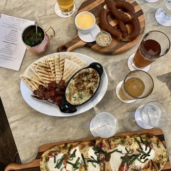 Pinstripes - Happy hour foods: margarita flatbread, spinach/artichoke dip, pretzel + 2 dipping cheeses - New American Near Me - Houston, Texas