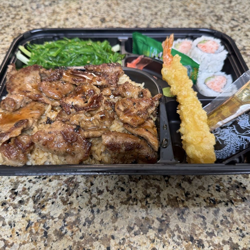 Beef Teriyaki, fried rice, tempura shrimp, seaweed salad and California sushi Beef Teriyaki, fried rice, tempura shrimp, seaweed salad and California sushi