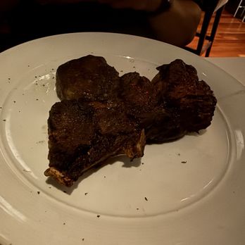 Eddie V's Prime Seafood - The 18 oz USDA Prime Bone-In Ribeye- my friend only eats well done so do not judge the chef -prepared as ordered! - Seafood Near Me - Orlando, Florida Eddie V's Prime Seafood - The 18 oz USDA Prime Bone-In Ribeye- my friend only eats well done so do not judge the chef -prepared as ordered! - Seafood Near Me - Orlando, Florida