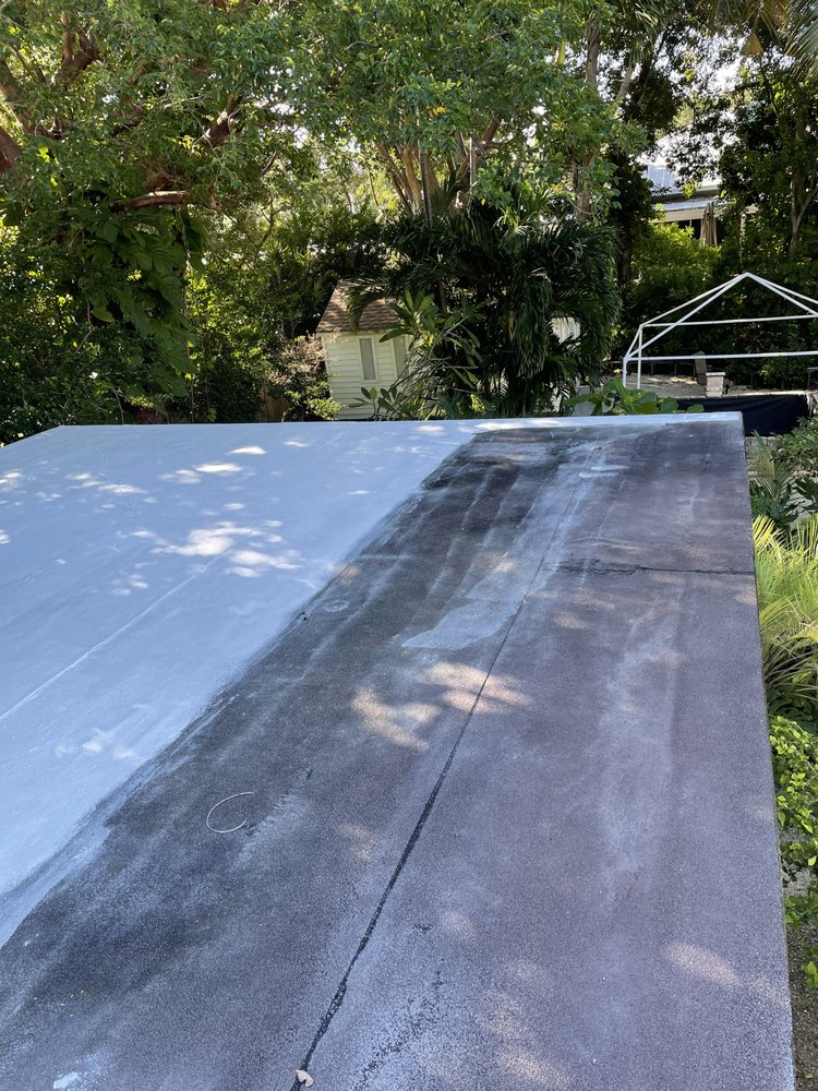 Slide of Andy The Roofer & Co