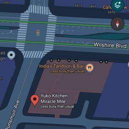 Yuko is at the back of the building, not seen from Wilshire Blvd. Go south on Dunsmuir Ave.